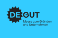 deGUT-Logoa uf blauem Hintergrund in scharzen Buchstaben